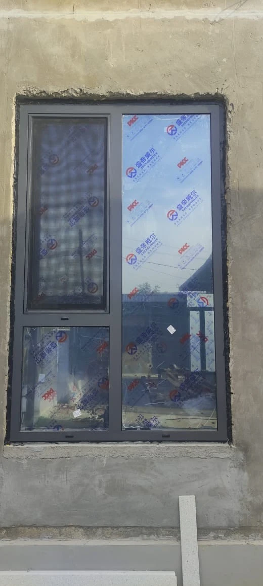 Customer and neighbours viewing 93 Series aluminium windows at a home project in Zafar, Tashkent